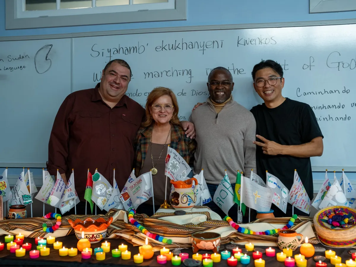 The four Accents co-founders in a multilingual worship space